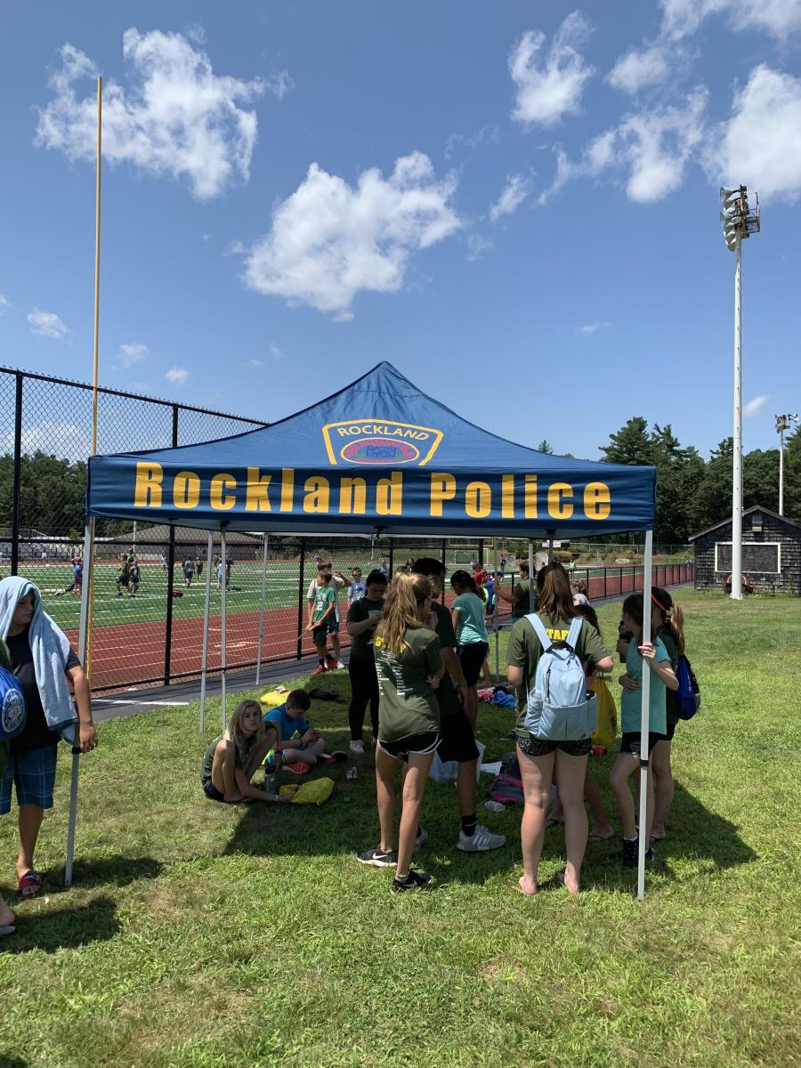 Kids under a Rockland Police Tent