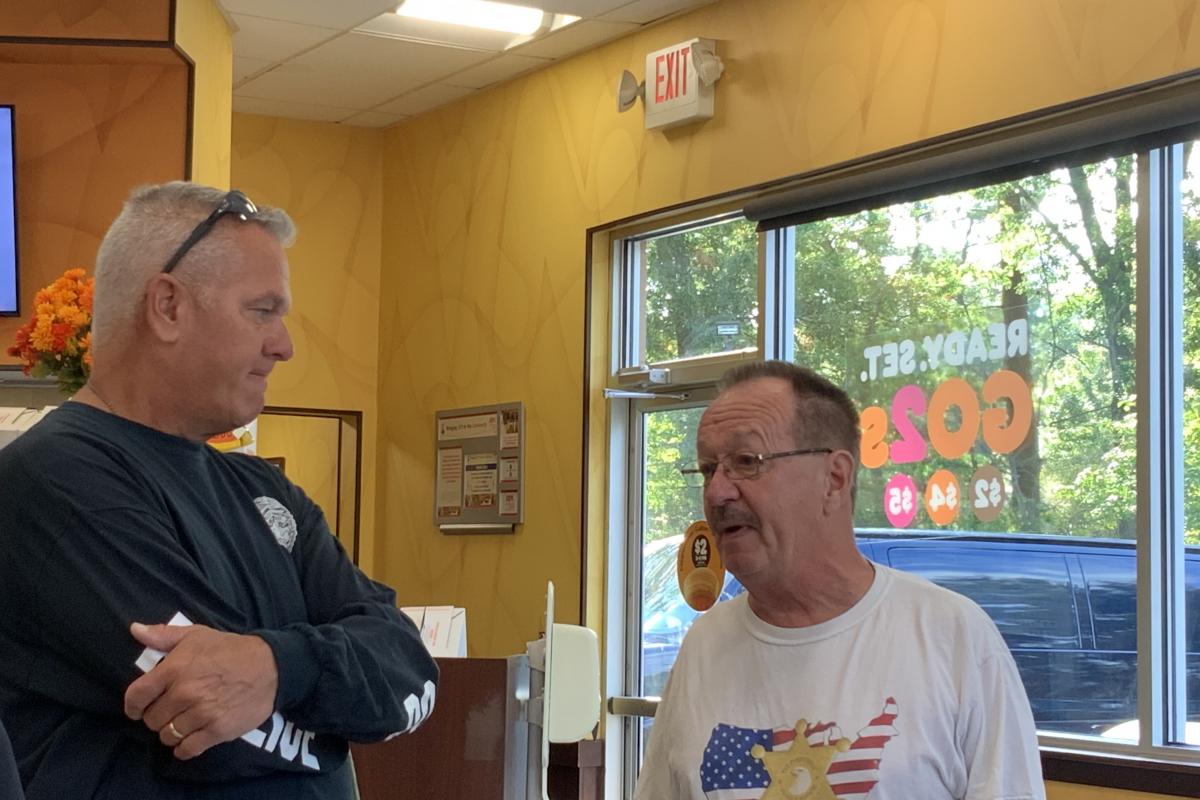 Man and Officer Talking